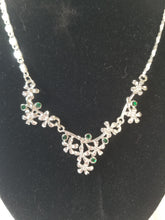 Load image into Gallery viewer, Handcrafted Silver Necklace with Silver Flowers and Emerald Gems Sets
